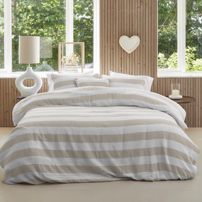 Natural stripe duvet cover in 100% cotton muslin on styled bed